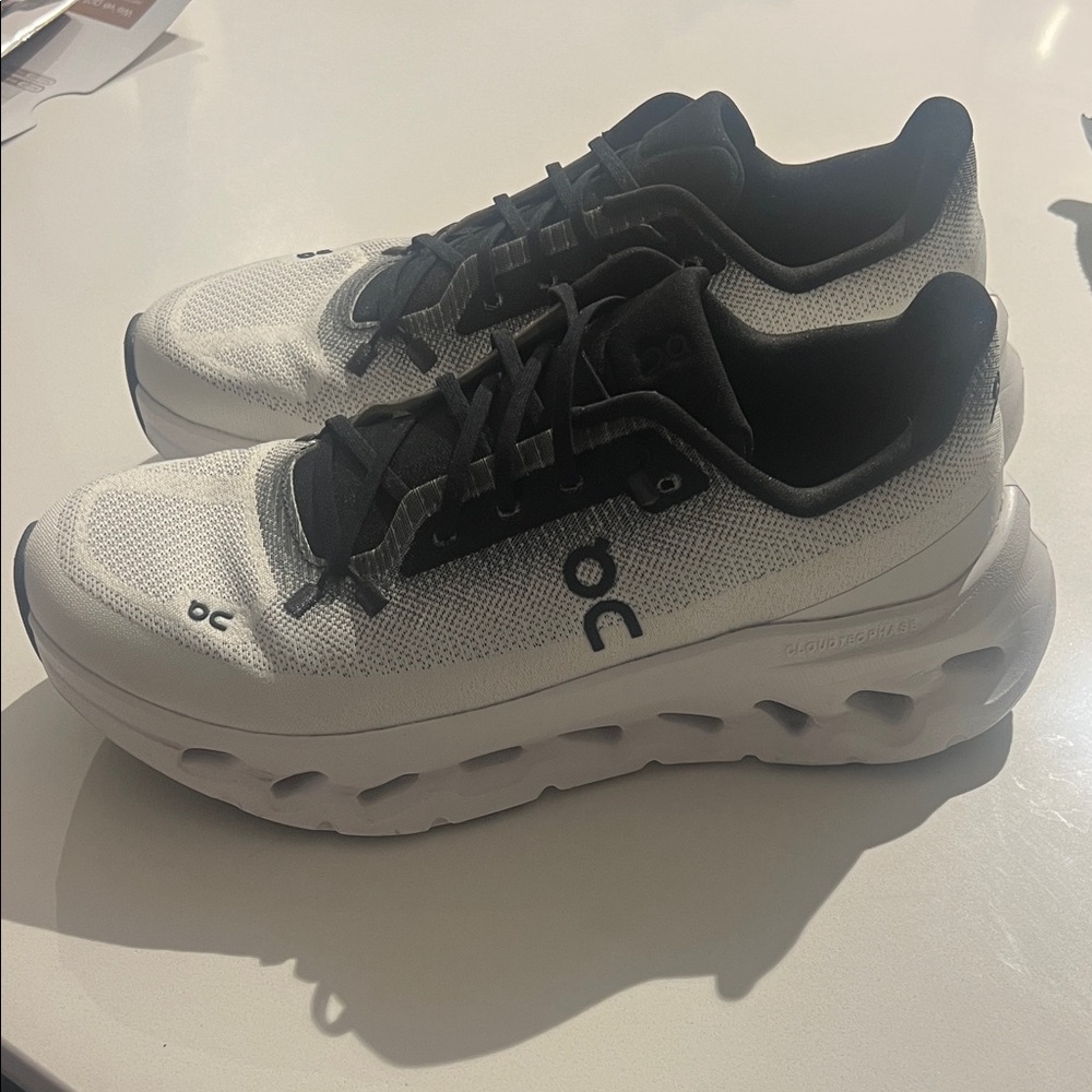 On clouds . Worn twice will fit women’s 9.5/10